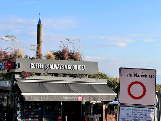 Restaurant on the roadway with a sign that says coffee is always a good idea
